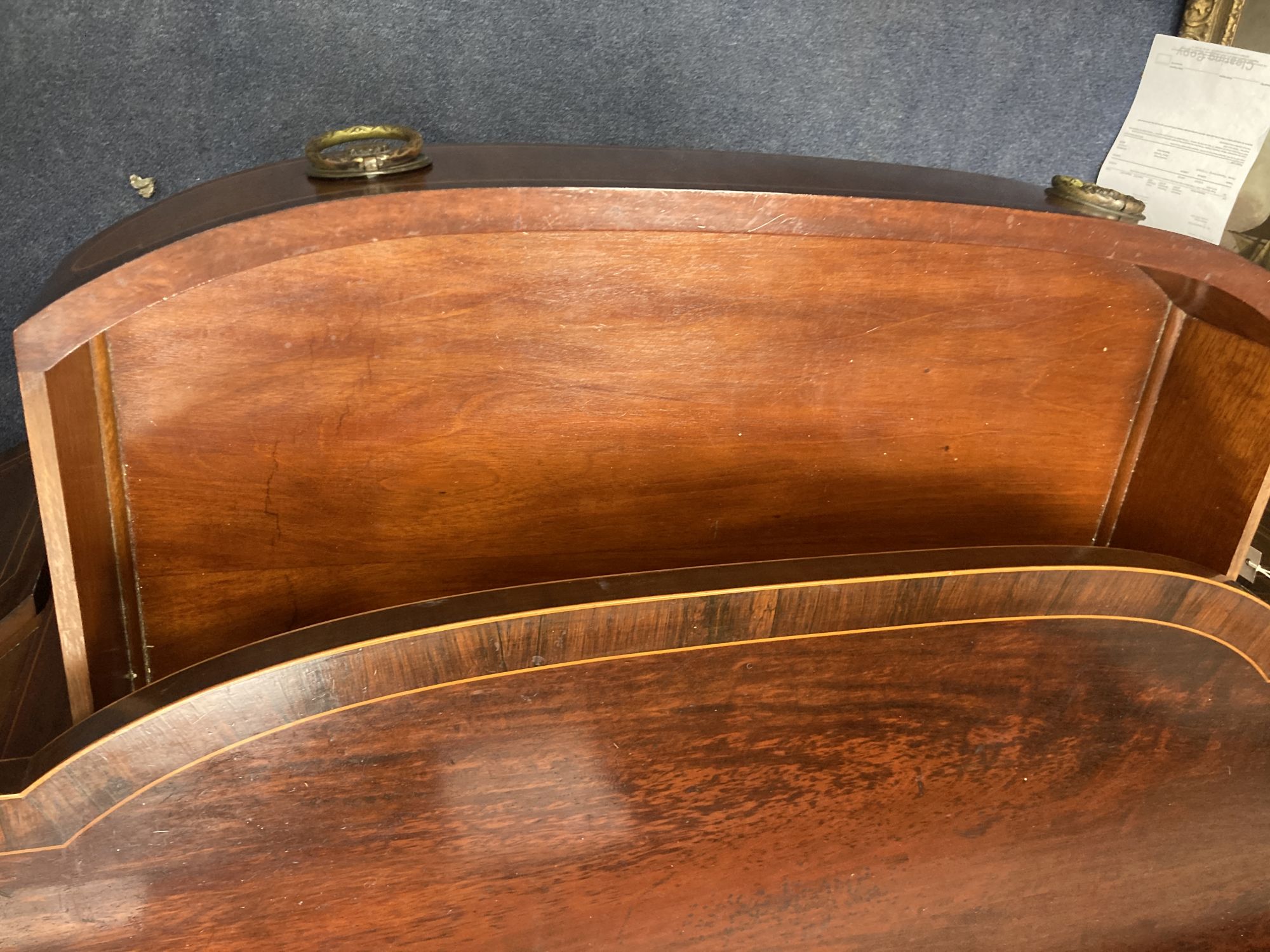 An Edwardian inlaid mahogany serpentine fronted sideboard, length 184cm, depth 68cm, height 112cm